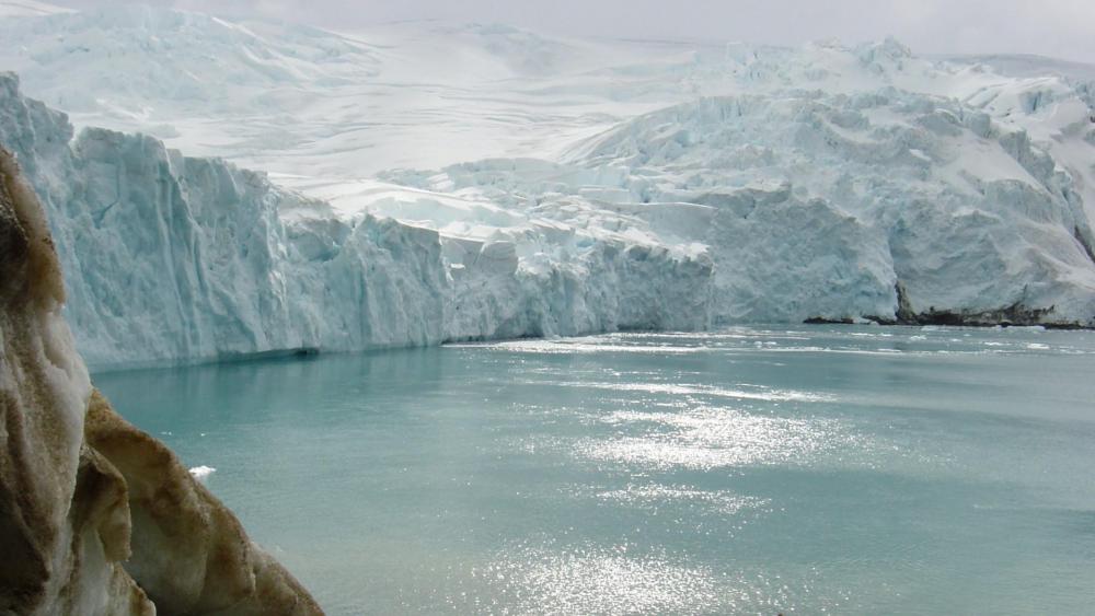 Glacial Serenity Captured in Nature's Embrace wallpaper