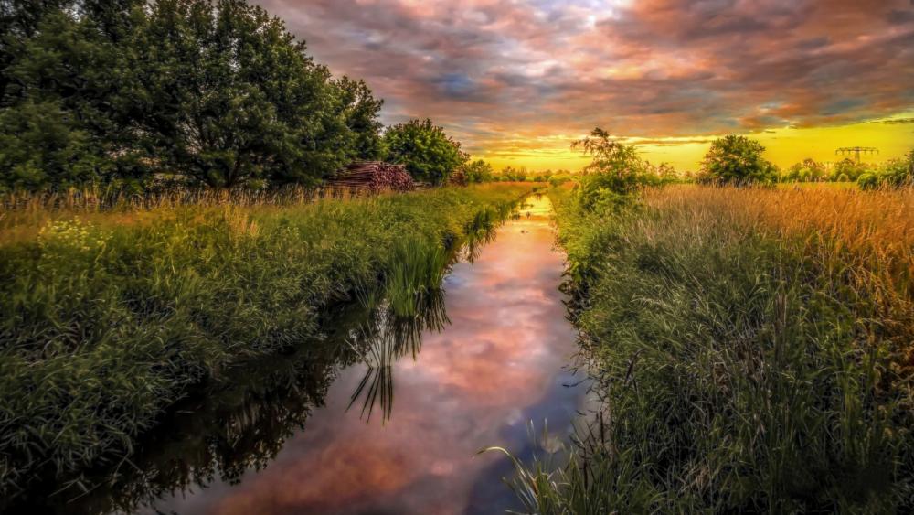 Summer sunset over the canal wallpaper