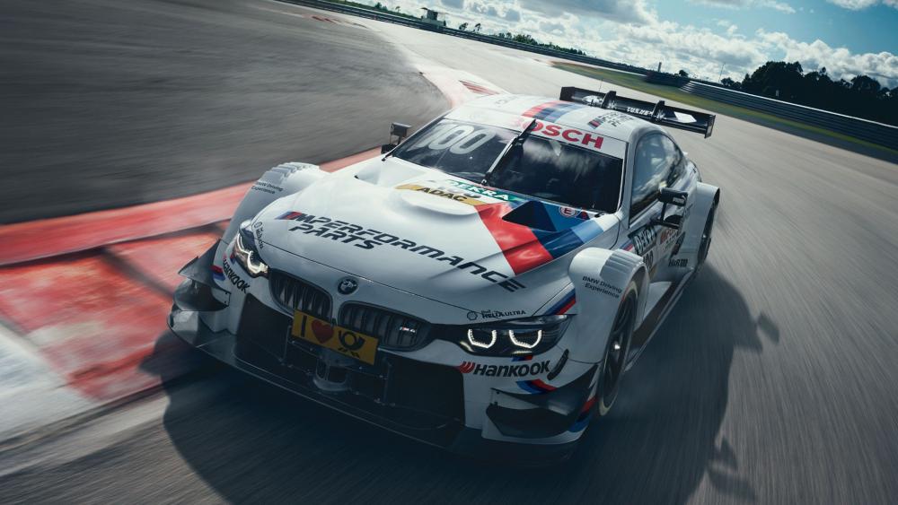 Speeding BMW on Racing Track wallpaper