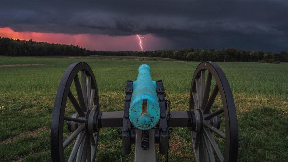Old Cannon in the lightning storm wallpaper