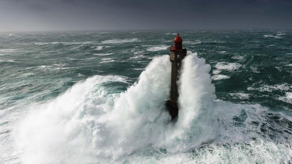 The Lighthouse of La Jument during storm wallpaper
