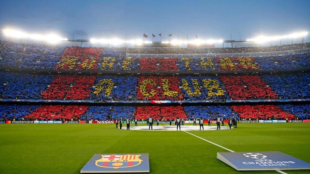 Barcelona Stadium Roars with Team Spirit wallpaper