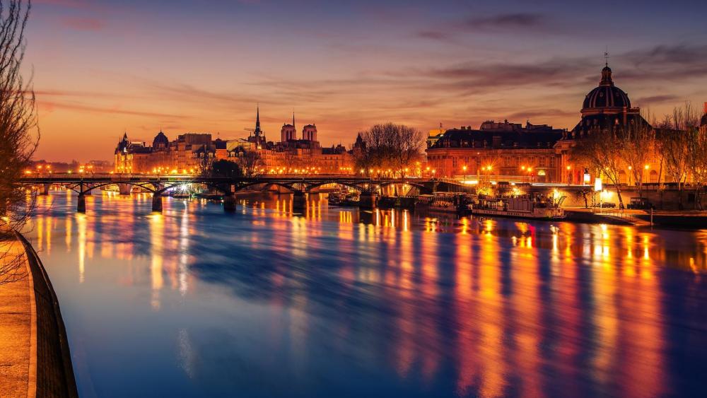 Old Town of Paris and Seine river in the sunrise wallpaper