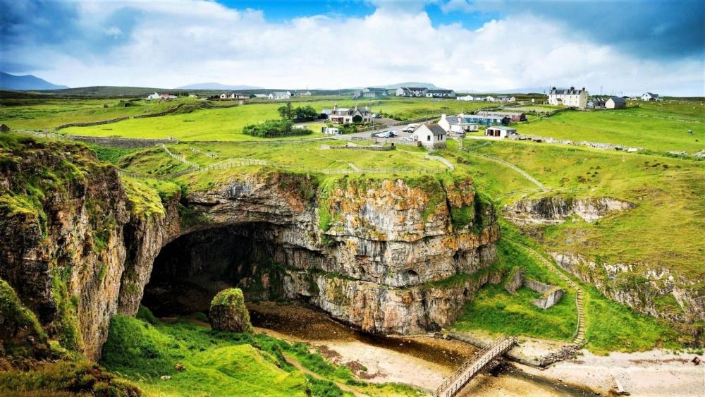 Scottish countryside and the Smoo Cave wallpaper