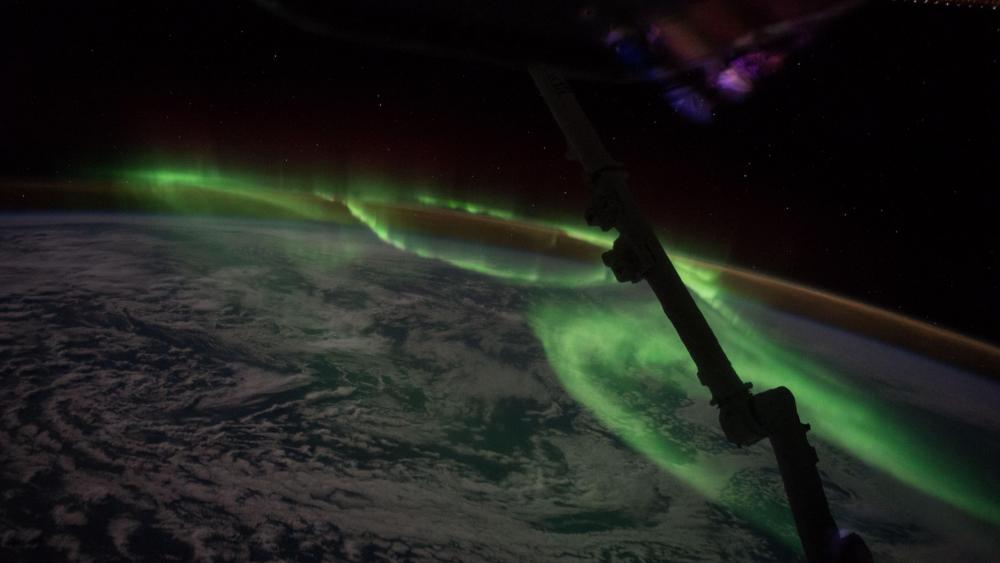 Polar lights (Aurora Australis) from the space wallpaper