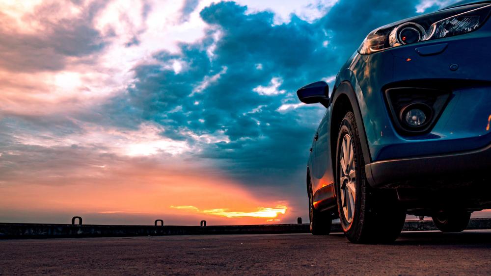 Sports car at sunset wallpaper