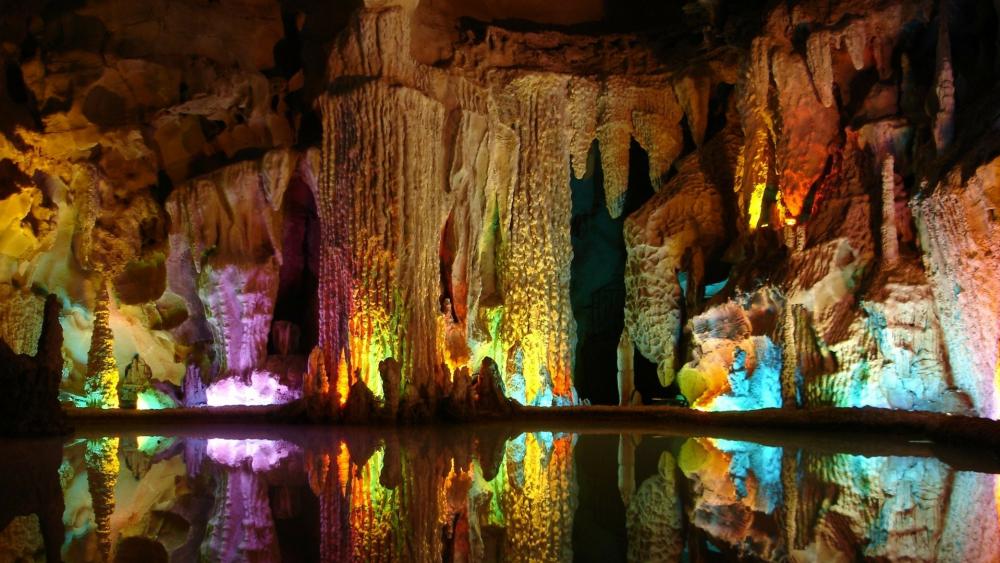Colorful stalactites in Assembling Dragon Cave wallpaper