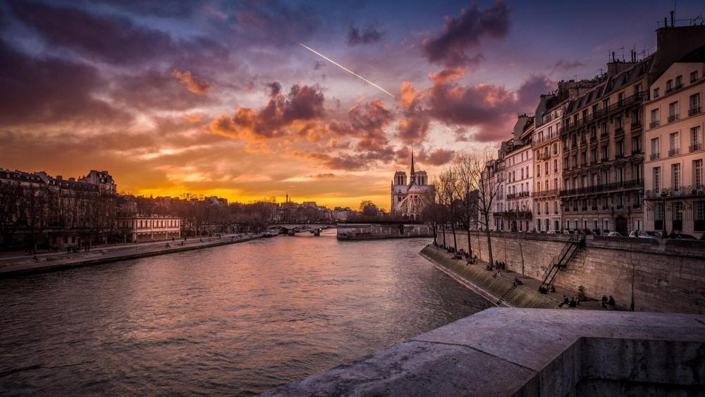River of Seine and the Notre Dame Cathedral in the distance wallpaper