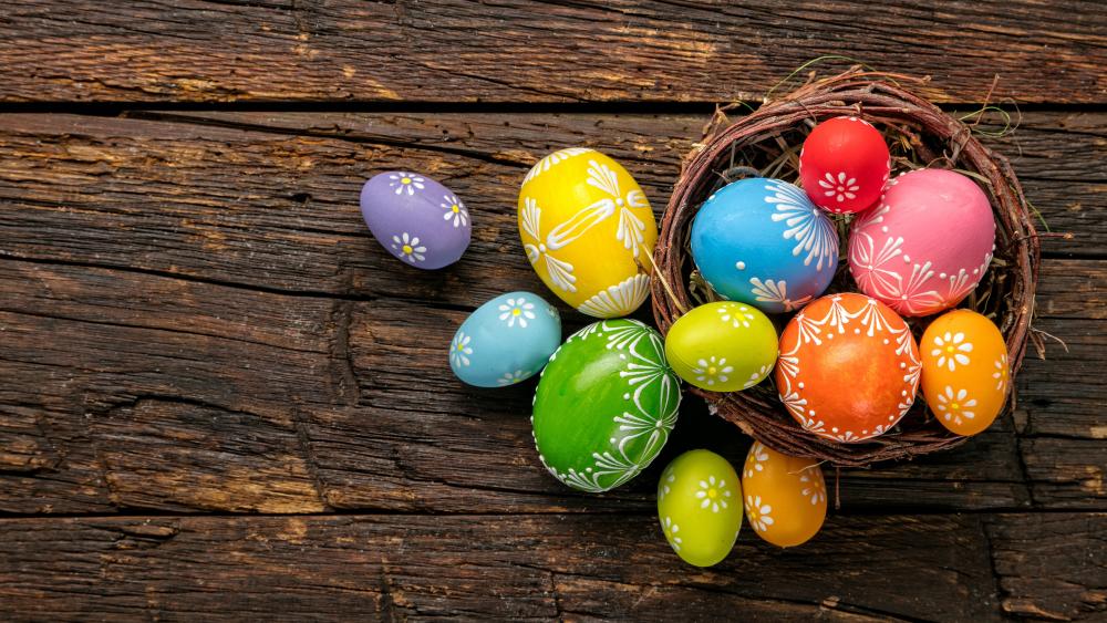 Colorful Easter eggs in a basket wallpaper