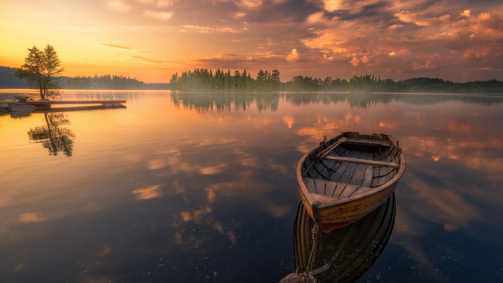 Boat in a silent lake wallpaper