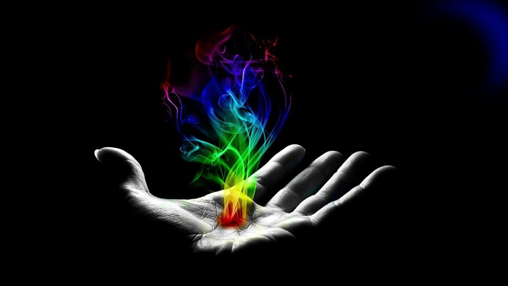 Mystical Hand Conjuring Colorful Flames wallpaper