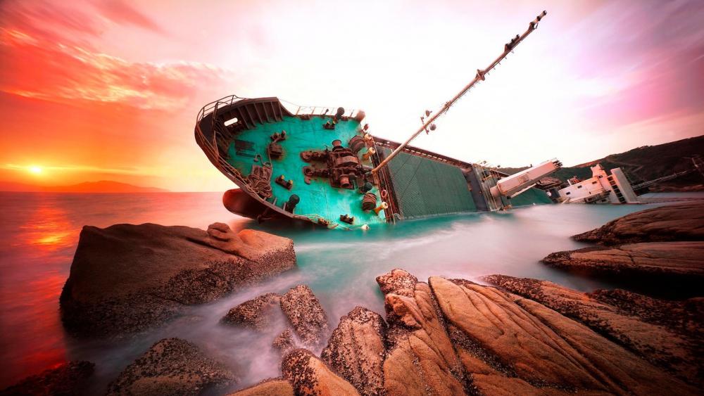Shipwreck in the sunset wallpaper