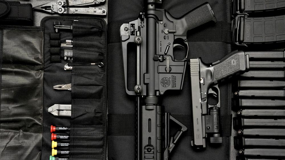 Tactical Gear and Handgun Collection wallpaper