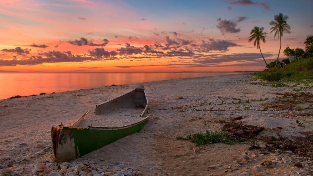 Wrecked boat in the sunset wallpaper