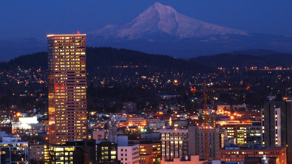 Bancorp Tower and Mount Hood at night wallpaper