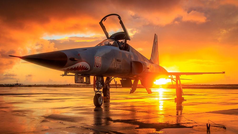 Majestic Fighter Jet at Sunset Glow wallpaper