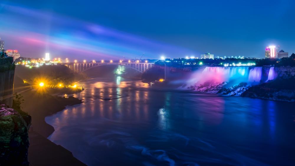Niagara Falls and the Rainbow Bridge at night wallpaper