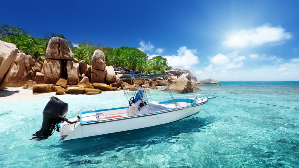 Motorboat on the crystal clear water wallpaper