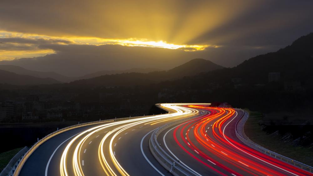 Light trails on highway - long exposure photography wallpaper