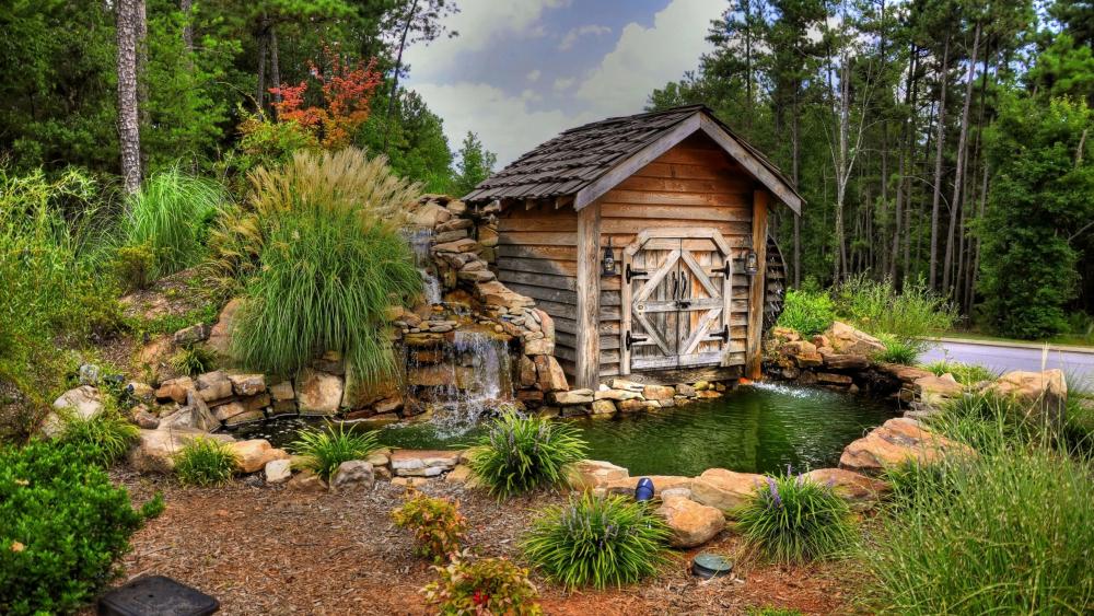 Watermill with a small pond wallpaper