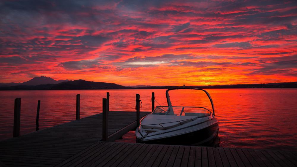 Motorboat at sunset wallpaper