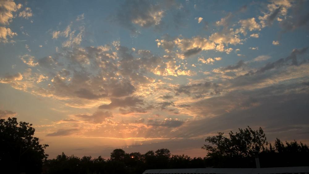 Serene Sunset Over Tranquil Landscape wallpaper