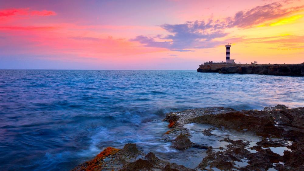 Lighthouse with colorful sky wallpaper