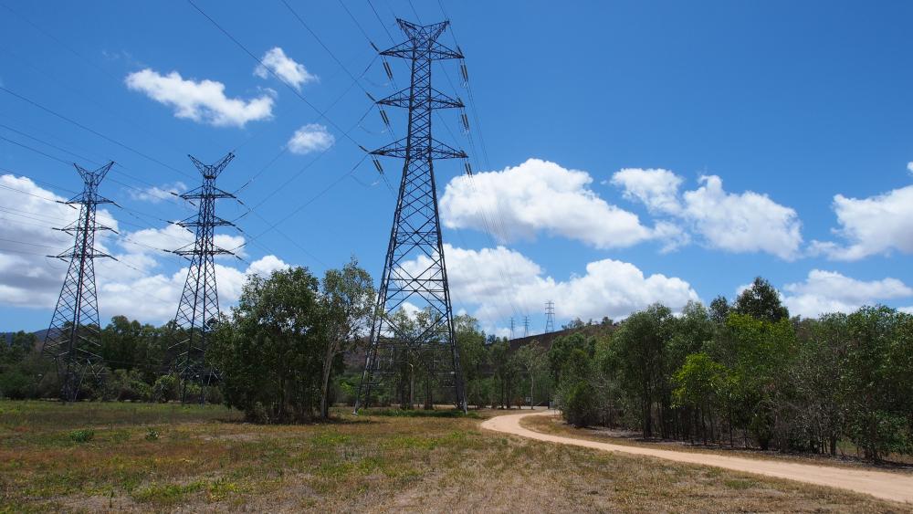 Skyward view of some Electrical Towers wallpaper