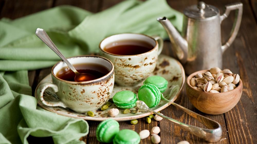 Tea with green macaroons wallpaper