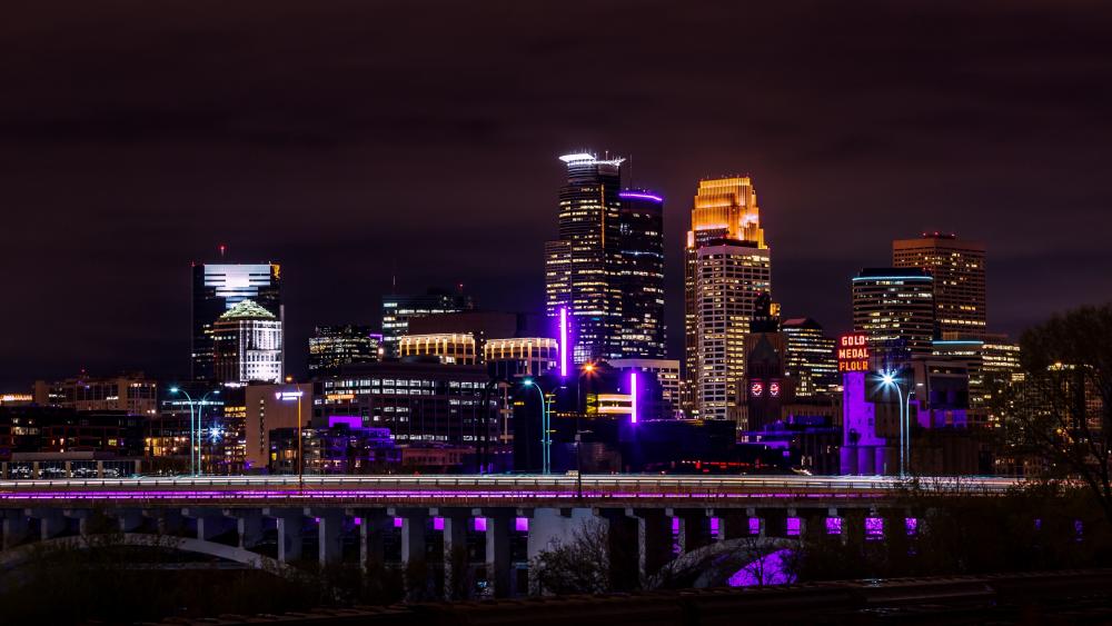 Minneapolis skyline lit up in purple wallpaper