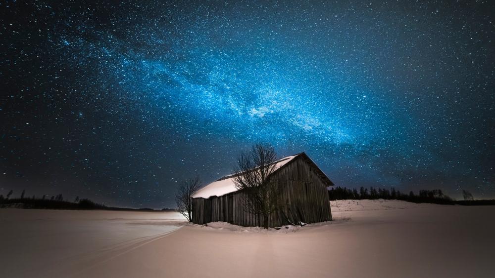 Milky way  over the snowy hut wallpaper
