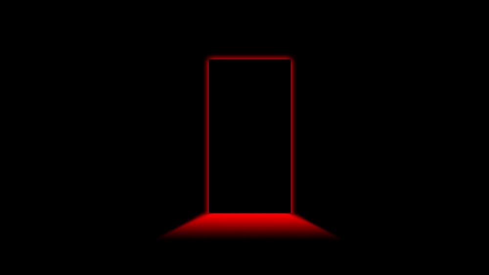 Mysterious Red-Lit Portal in Darkness wallpaper