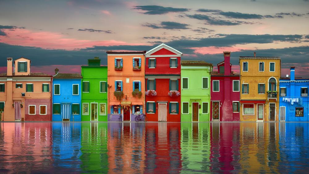 Colorful houses reflecting in a canal wallpaper