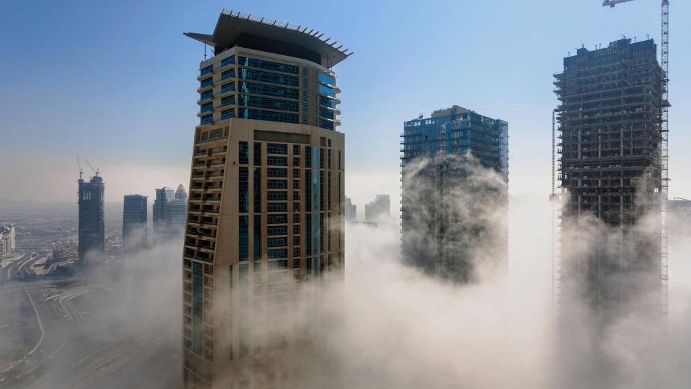 Dubai's Skyscrapers Above the Clouds wallpaper