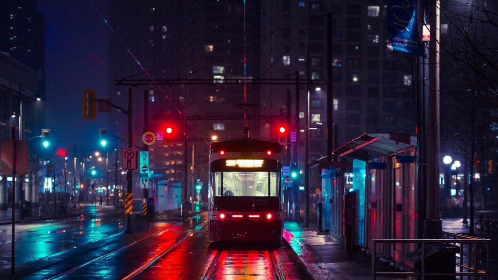 Rainy Night in the City with Tram wallpaper