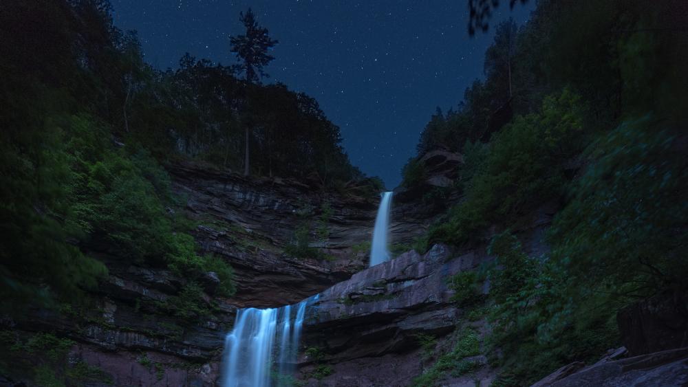 Waterfall under the starry sky wallpaper