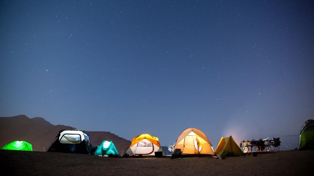 Tents under the starry sky wallpaper
