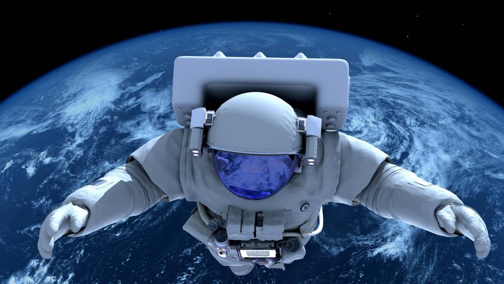 Astronaut looking down at planet earth wallpaper
