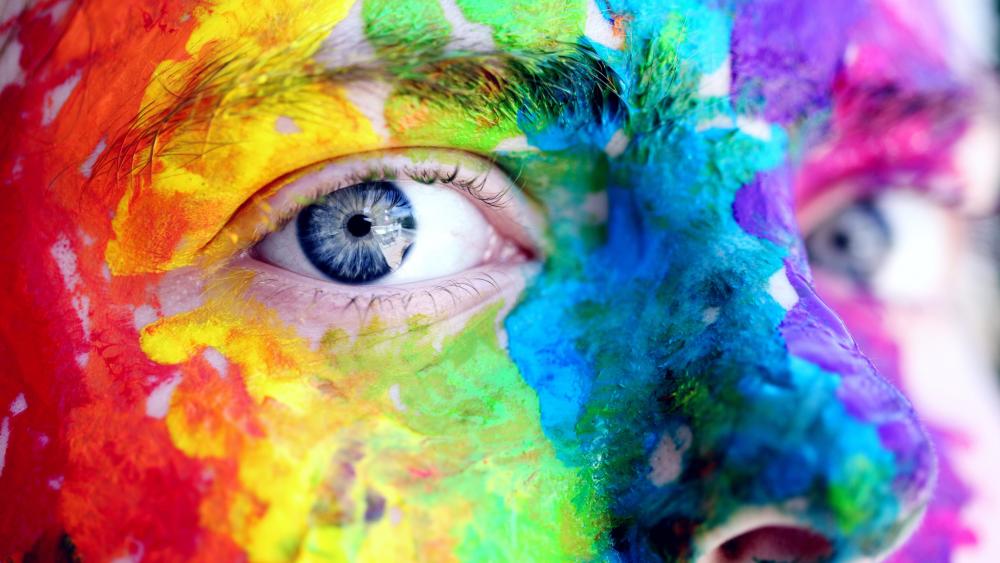 Colorful face with blue eye wallpaper