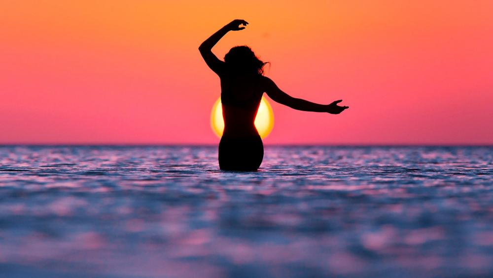 Bathing in the sunset wallpaper