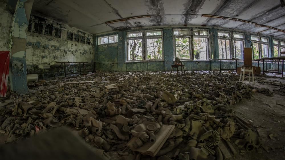 Gas masks on the floor in an abandoned building in Chernobyl wallpaper