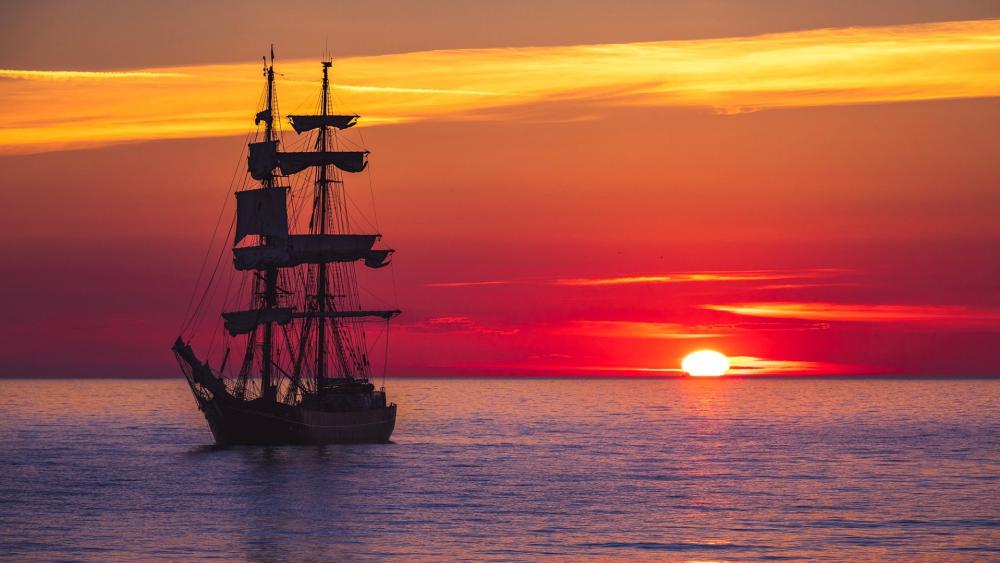 Masted ship in the sunset wallpaper