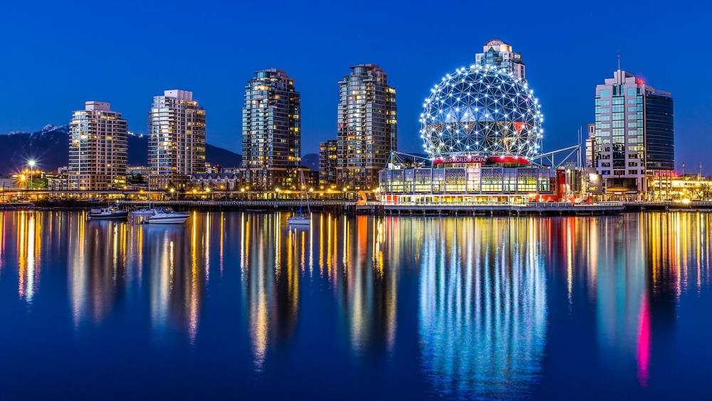 Vibrant Cityscape Reflected at Dusk wallpaper