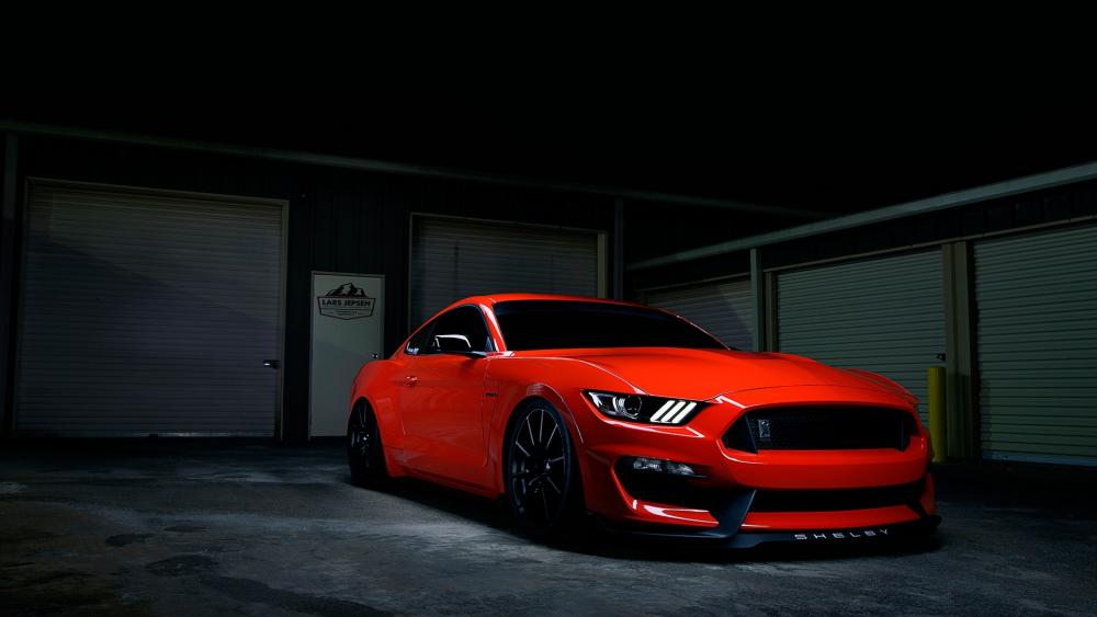 Sleek Red Mustang in Dark Garage wallpaper