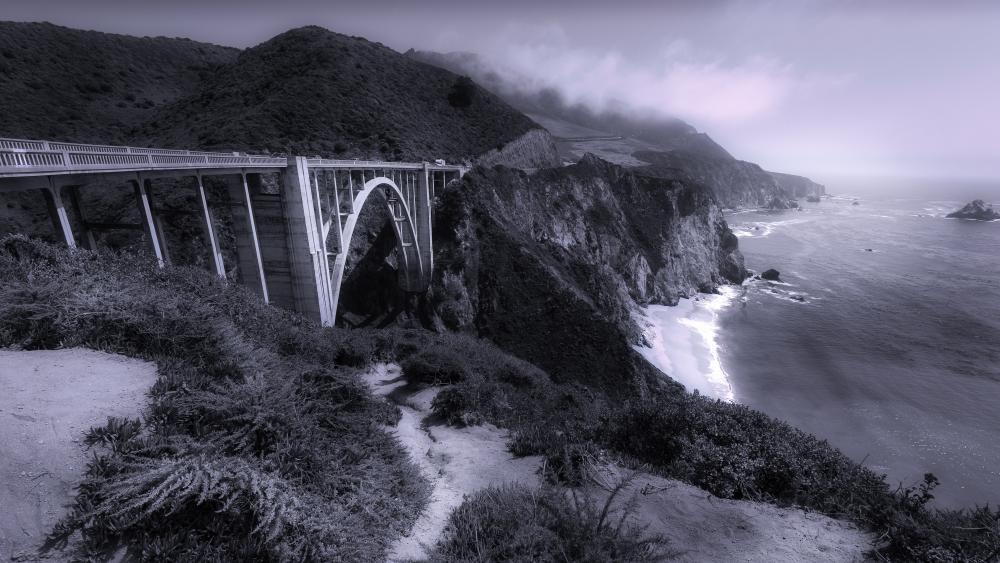 Majestic Coastal Bridge in Monochrome wallpaper