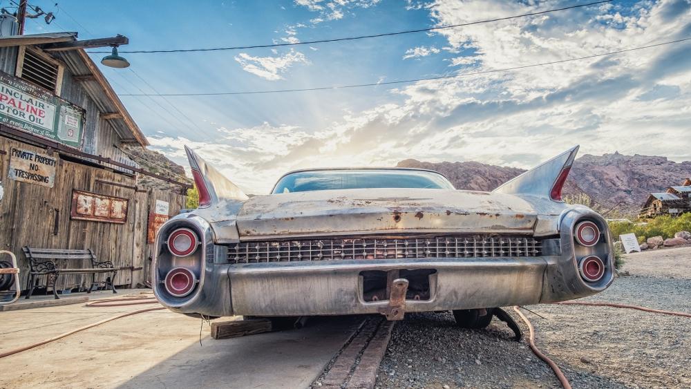 Classic Cadillac in Desert Sunset wallpaper