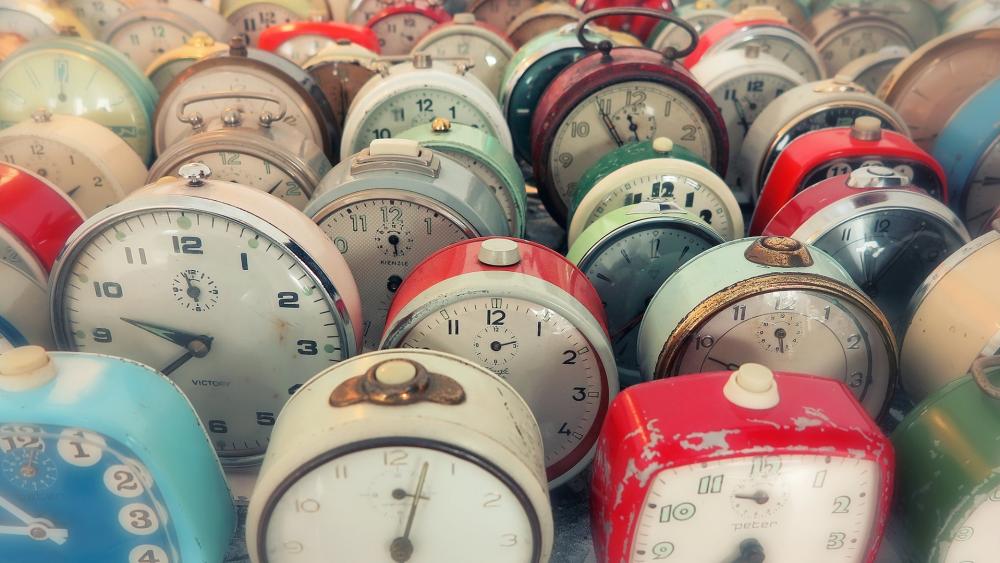 Timeless Harmony: Clocks in Unison wallpaper