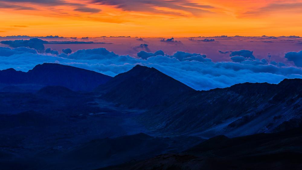 Sunset Over Mountain Peaks wallpaper