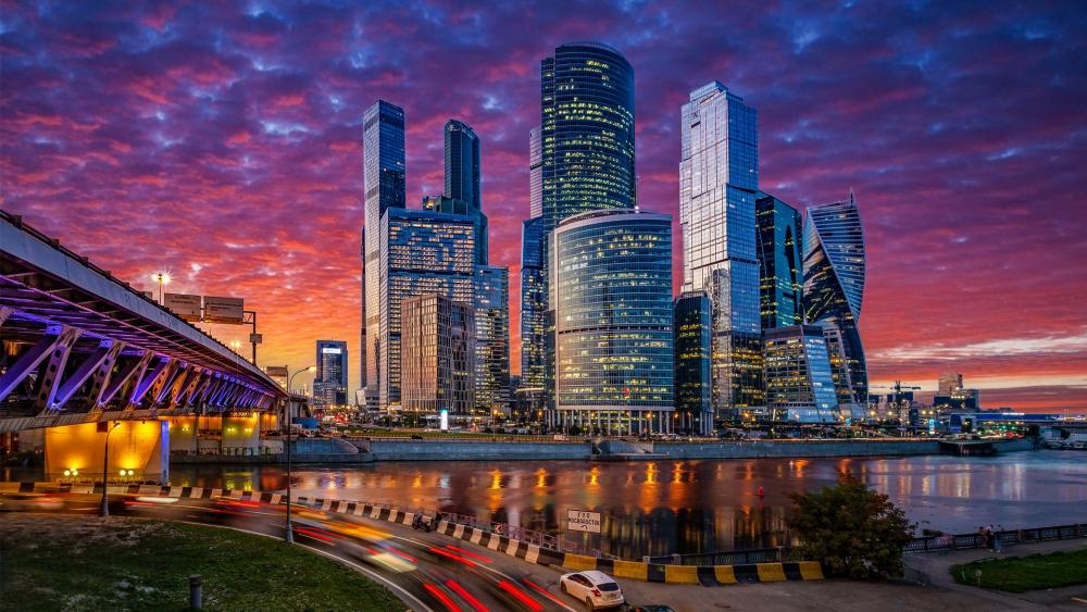 Dynamic Cityscape at Sunset Reflection wallpaper