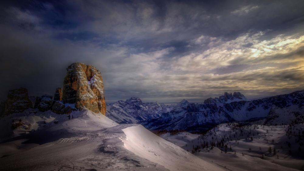 Majestic Mountain Landscape Under Dramatic Sky wallpaper